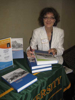 Dr. Ute Schmidt autographing her book at the Author’s Event, Hilton Garden Court Hotel, Bloomington, MN, 14 July 2012, sponsored by the North Star Chapter of Germans from Russia.