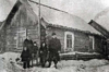 Rosa (Diede) Kopp with her family in the barracks of Siberia.