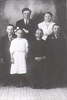 Photo of the Schelert family of Yakima, Washington including (front row): Lydia, Mrs. Albertina and Herbert Schelert; (back row): Adolph, Albert and Martha. Albert Schelert farmed in North Dakota and Montana before moving to the Yakima Valley where he farmed northwest of Toppenish, Washington. Albert was born in Volhynia on April 23, 1895. He was the son of Edward and Albertina (Lou) Schelert. He immigrated to the United States in 1909 with his family. In 1924, he married Lydia Fauth in North Dakota. Albert and Lydia Fauth Schelert had fourteen children.