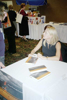 Debra Marquart, autographing her book.