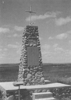 A field-stone cairn erected in 1975 near Selz, ND, in honor of the Catholic pioneer settlers who immigrated from the Kutschurgan District villages today near Odessa, Ukraine.