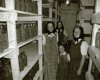 Girls in canning area in the kitchen basement.