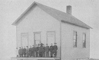 Early county school house in Kisselberry District taken in 1912.
