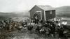 Albert Knodel and his son Lloyd feeding turkeys, about 1934.